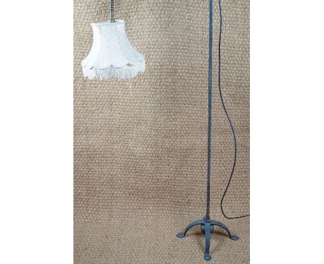 An early 20th Century Arts and Crafts wrought iron standard lamp, 162 cm