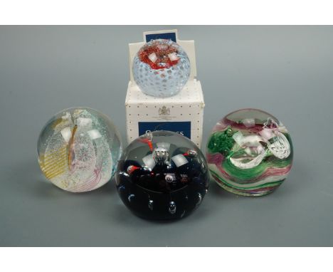 Four Caithness paperweights including Extravaganza and Daydream