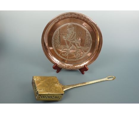 An early 20th Century Johnny Walker Scotch Whisky embossed copper bar tray together with a brass chestnut roaster