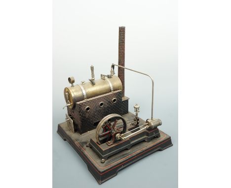 A boxed Doll and Co horizontal live steam engine, 28 cm x 28 cm