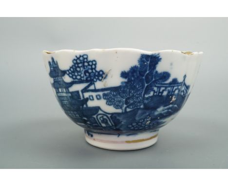 A Caughley blue-and-white pagoda pattern porcelain tea bowl, circa 1770, (a/f)