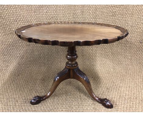 A quality Georgian-influenced mahogany tripod coffee table, 69 cm x 52 cm