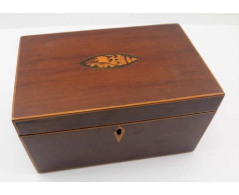 A 19TH CENTURY MAHOGANY TEA CADDY, having hinged lid inset shell patera, opening to reveal two inner lidded compartments, wit