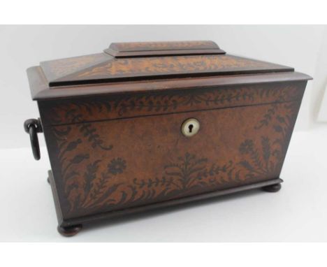 AN EARLY 19TH CENTURY SARCOPHAGUS FORM MARQUETRY ROSEWOOD &amp; BURR MAPLE TEA CADDY, the hinged cover opening to reveal twin