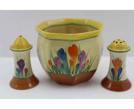 A CLARICE CLIFF BIZARRE CHESTER SHAPE CACHE POT, hand painted crocus pattern, 9cm high, together with a pair of CLARICE CLIFF