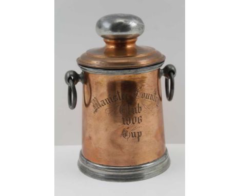 AN EARLY 20TH CENTURY AMERICAN GOLF TROPHY, engraved "Manistee Country Club 1906 Cup", "Won by J.W. Dempsey", in the form of 