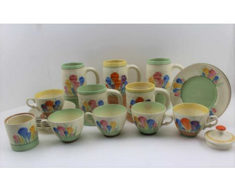 A COLLECTION OF ROYAL STAFFORDSHIRE POTTERY WARES, hand painted crocus pattern, after design by Clarice Cliff, comprising; th