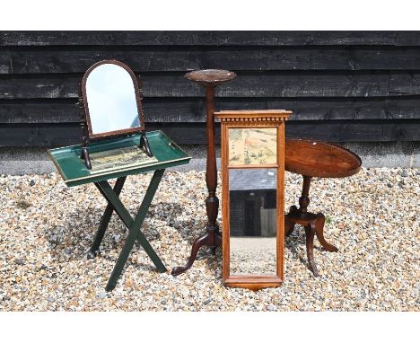 A mahogany tripod torchere/plant stand to/w an oval wine table, tray on folding stand, wall mirror and small toilet mirror (5