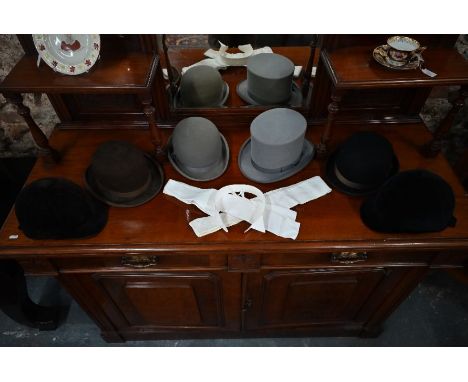 Four various riding bowlers and two riding hats, to/w a grey top hat and four hunting waistcoats (10)
