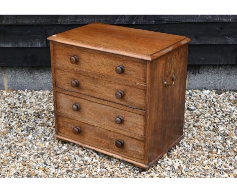 A 19th century style mahogany commode cabinet