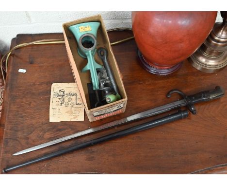 An 1879 St Etiennes bayonet in scabbard to/w a vintage Harper table-mounting mincer in original box (2)