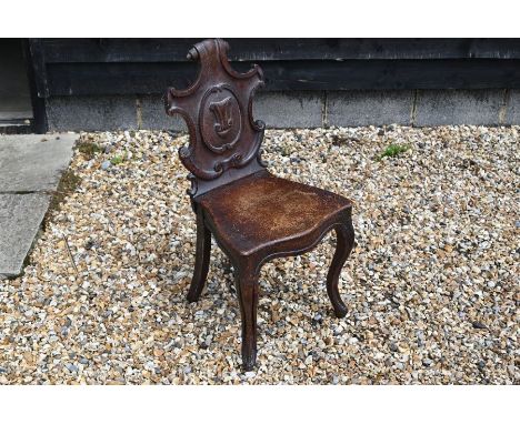 A Victorian carved oak hall chair with cartouche back to/w a rustic three-legged milking stool, silver-mounted ebony walking 