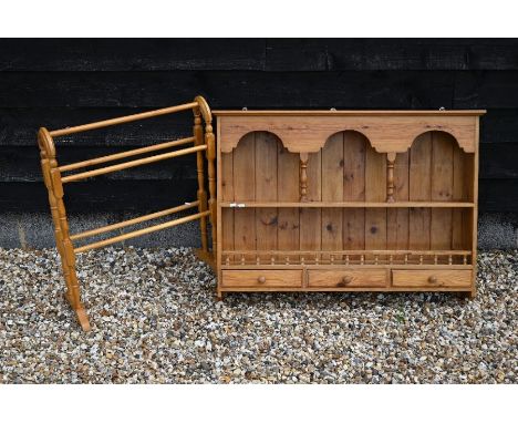 A stained pine spice rack wall unit with three drawers, 100 cm wide x 15 cm deep x 76 cm high to/w a turned beech towel rail 