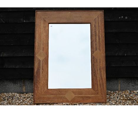 A Barker and Stonehouse bevelled rectangular wall mirror in mango-wood frame inlaid with flagstone tiles, 90 cm w x 120 cm h&