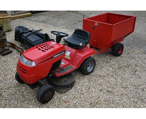 A Jonsered LR10 tractor mower with power built Briggs &amp; Stratton 10HP engine (model 28A707) c/w various attachments and R