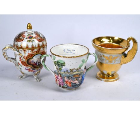 A Continental ovoid cup and cover, the quatrefoil reserves painted with figures in Arcadian coastal landscapes, with twisted 