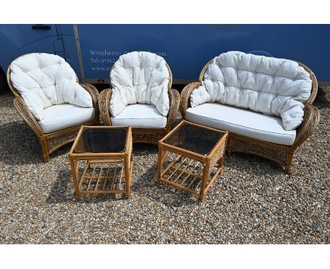 A bamboo and wicker conservatory suite comprising two seater sofa, pair of armchairs and pair of glass topped side tables (5)