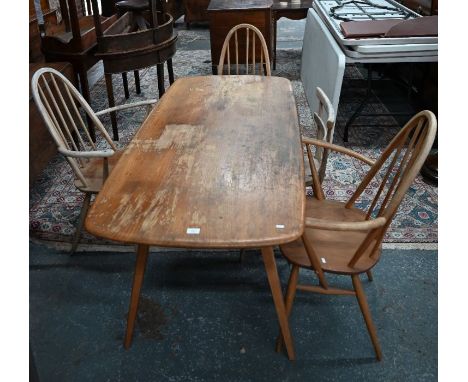 A Mid Century Ercol light elm Windsor dining table, 150 x 75 x 72 cm high to/w four Ercol spindle and hoop back Quaker chairs