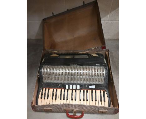 An Orfeo marbled piano-accordion in casecase a/f