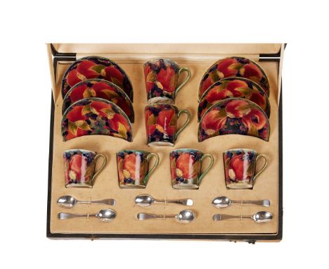  WILLIAM MOORCROFT (1872-1945) FOR MOORCROFT POTTERY 'POMEGRANATE' PATTERN ASSEMBLED AND BOXED COFFEE SET, CIRCA 1914 glazed 