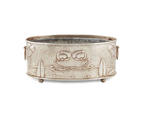  SCOTTISH GLASGOW SCHOOL PLANTER, CIRCA 1900 repoussé-decorated white metal, with removeable liner 35cm across   