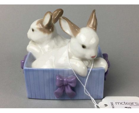 NAO FIGURE GROUP OF BUNNIES,along with a further Nao figure and a Goebel figure (3)