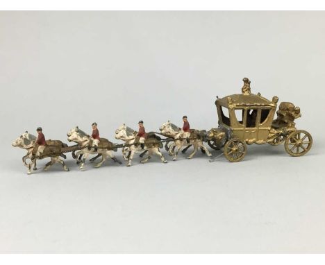 BRITAIN'S MODEL OF THE CORONATION CHAIR,along with a model of the Queen's carriage, an annointing spoon and a carved wood bar