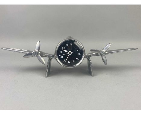 MANTLE CLOCK MODELLED AS A PROPELLER,33cm wide, along with two carriage clocks, an anniversary clock and another (5)