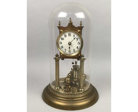 BRASS ANNIVERSARY CLOCK,under glass dome, 31cm high