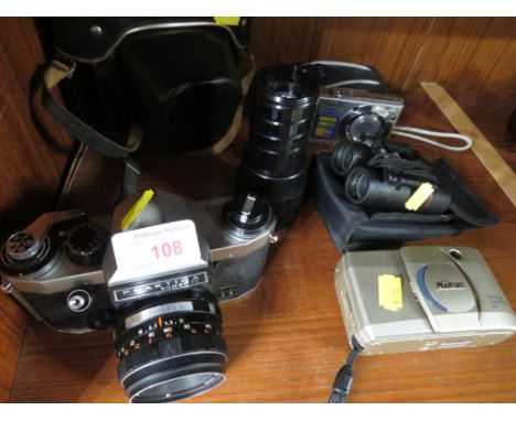 A PRAKTICA TL FILM CAMERA WITH CASE, OTHER CAMERAS AND A PAIR OF BINOCULARS.