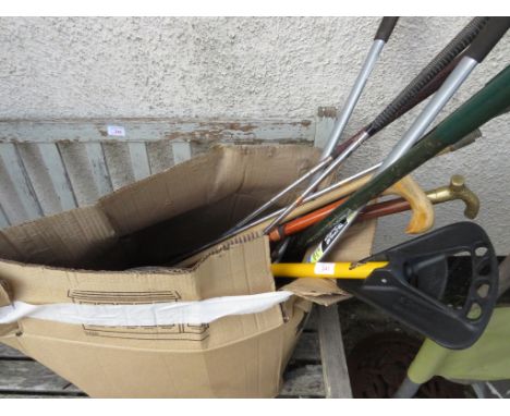 A SELECTION OF GARDENING HAND TOOLS ,WALKING STICKS , GOLF CLUBS AND OTHER ITEMS.  (AF)