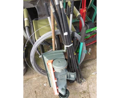 A SMALL SELECTION OF GARDEN HAND TOOLS , CABLE WIRE AND A FISONS SEED SPREADER ATTACHMENT, AND DRAIN RODS