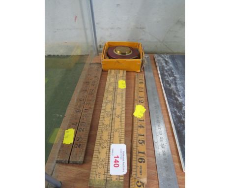 GERMAN MADE STEEL TAPE MEASURE TOGETHER WITH SELECTION OF VINTAGE RULERS.