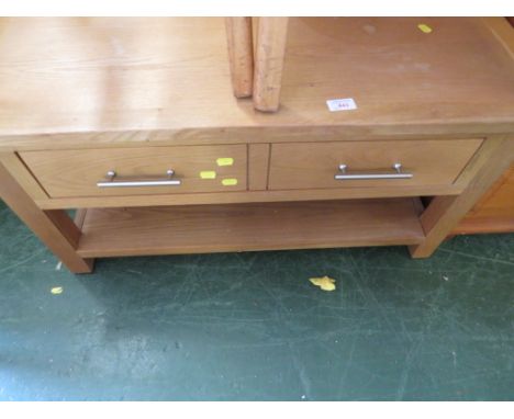 LIGHT OAK TWO TIER COFFEE TABLE WITH SINGLE DRAWER.