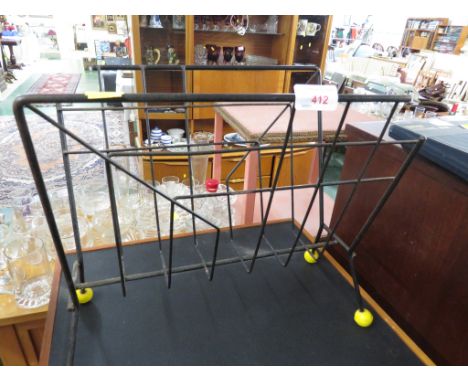 VINTAGE ATOMIC STYLE WIRE MAGAZINE RACK.