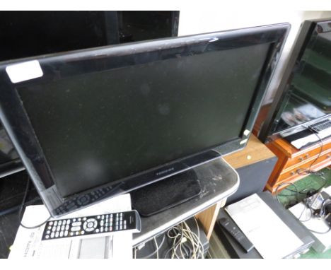 TOSHIBA 22 INCH LCD TELEVISION WITH BUILT IN DVD PLAYER TOGETHER WITH REMOTE AND MANUAL.