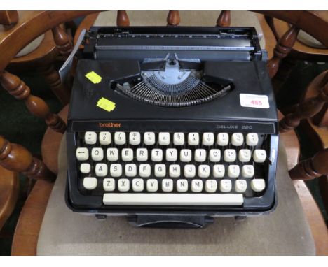 BROTHER DELUXE 220 MANUAL TYPEWRITER WITH CASE.