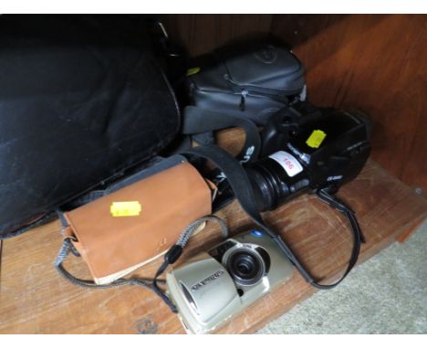 OLYMPUS IS 1000 FILM CAMERA WITH CASE TOGETHER WITH ONE OTHER CAMERA.