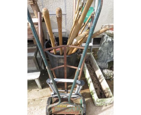 A SELECTION OF GARDEN HAND TOOLS , SUN DIAL TOP (AF), BLACK PLASTIC BIN, VICE, QUALCAST PANTHER 30 AND TWO SACK TRUCKS .