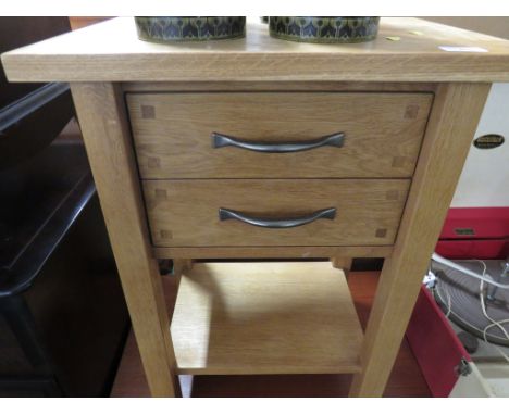 LIGHT OAK TWO-TIER SIDE TABLE WITH TWO DRAWERS.