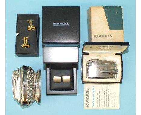 A Ronson table lighter with gadrooned decoration, a Ronson Varaflame lighter, boxed, a pair of Wedgwood cufflinks and a pair 