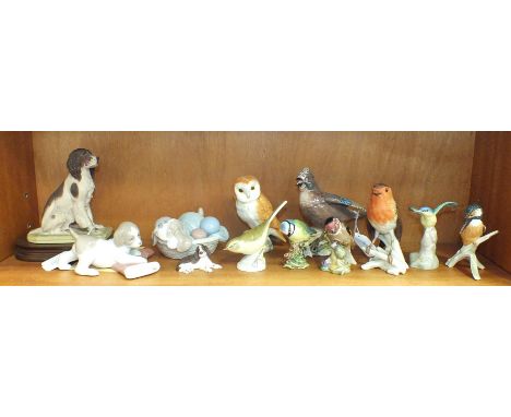 Four Beswick bird figures, 'Jay' 2417, 'Blue Tit' 992, 'Goldfinch' 2273, 'Owl' 2026, two Goebel birds, 'Robin', 'Kingfisher' 