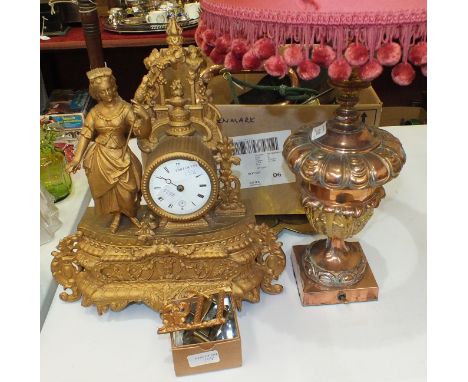 A copper and brass urn-shaped table lamp, 52cm high, an R De Lacy copper and brass bugle, (a/f), a gilt spelter mantel clock,