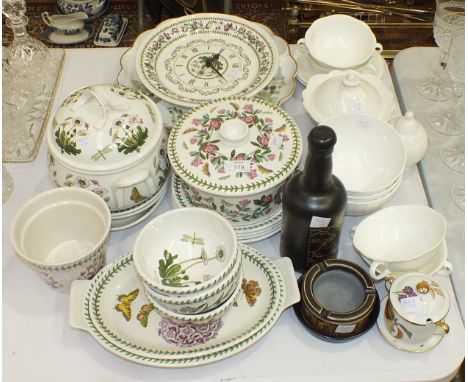Sixteen pieces of Portmeirion 'The Botanic Garden', including a wall clock, various tea and dinner ware and other ceramics.
