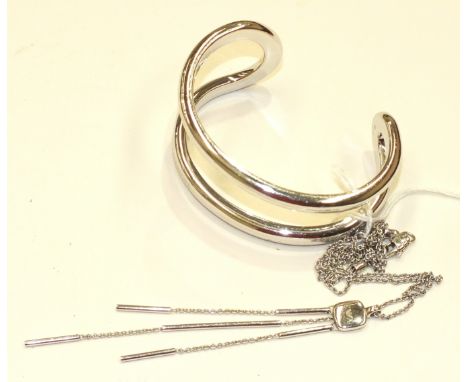 Emporio Armani, a silver bangle, boxed and an Emporio Armani silver tassel pendant on chain, 75g, (2).