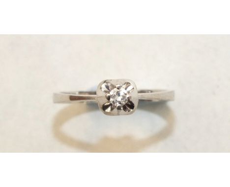 A solitaire diamond ring claw-set a brilliant-cut diamond, in 18ct white gold mount, size M, 2.5g.
