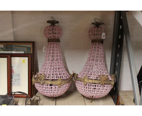 Two pink glass beaded light fittings 