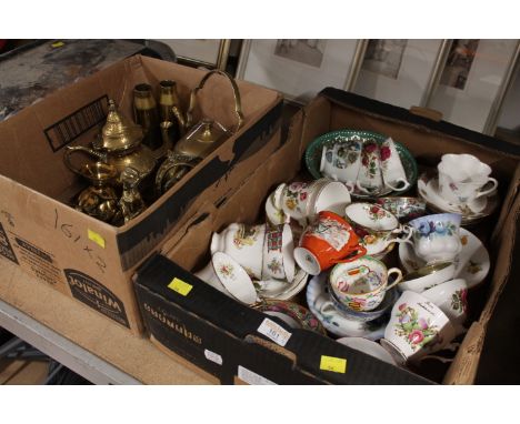 Box of brassware and box of decorative teacups and saucers 