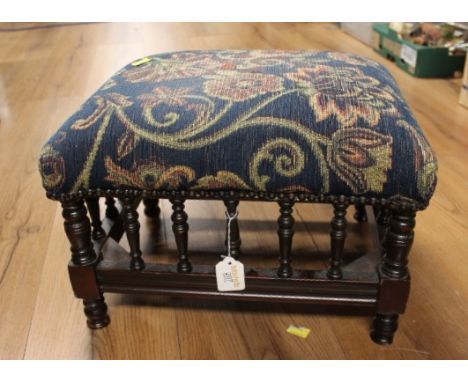 Wooden footstool with blue tapestry top