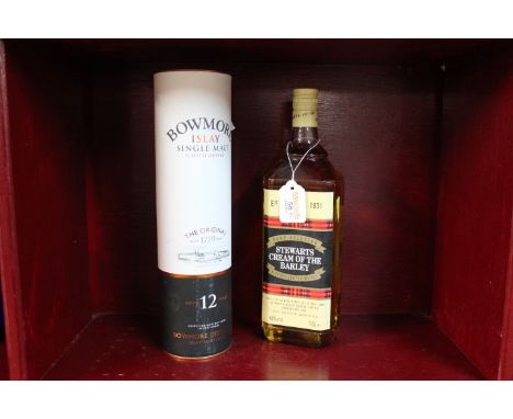 Bottle of Bowmore Islay Single Malt Scotch Whisky, 12 Years, and bottle of Stewart Cream of The Barley Scotch Whisky 
